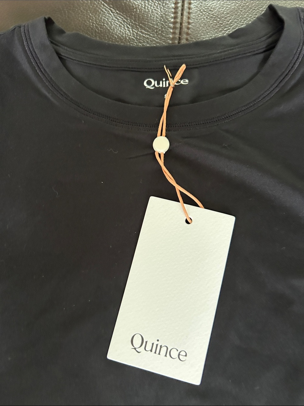 Quince Black Crewneck Tee with White Tag